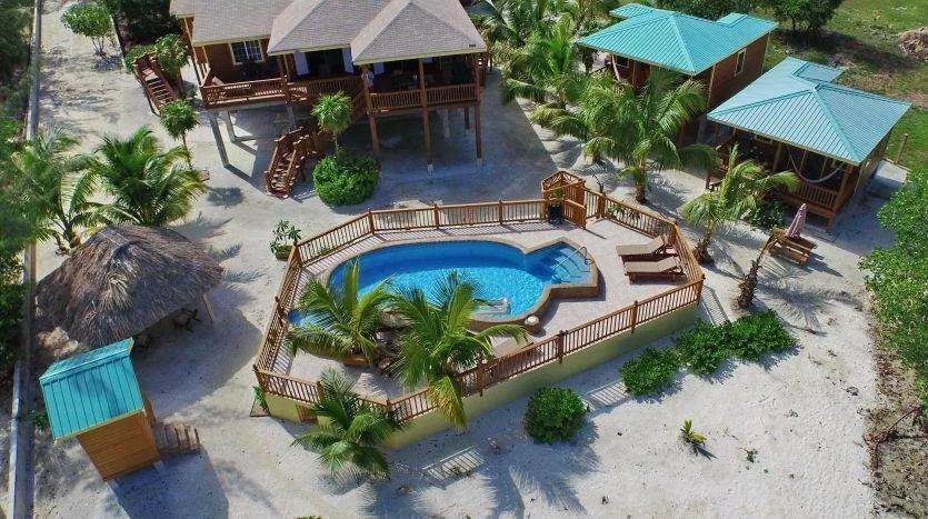Luxury 3-Bedroom Home with Two Turnkey Income-Producing Rental Units, Gorgeous Sunset & Sea-views